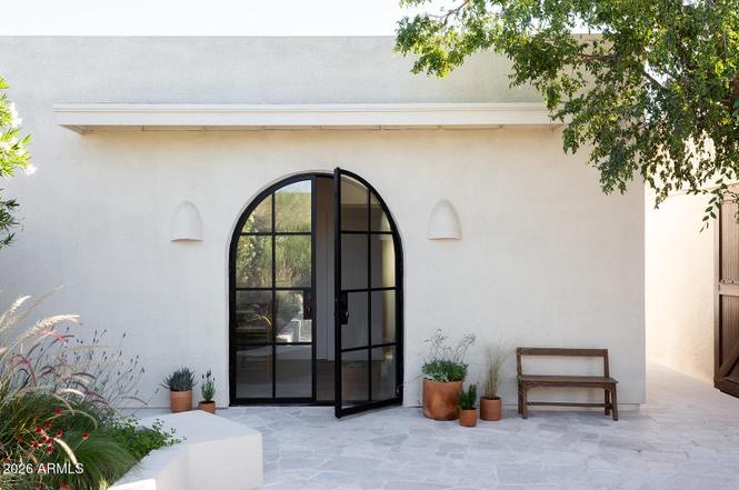 1920s Spanish Revival exterior with terracotta tile roof — Arizona