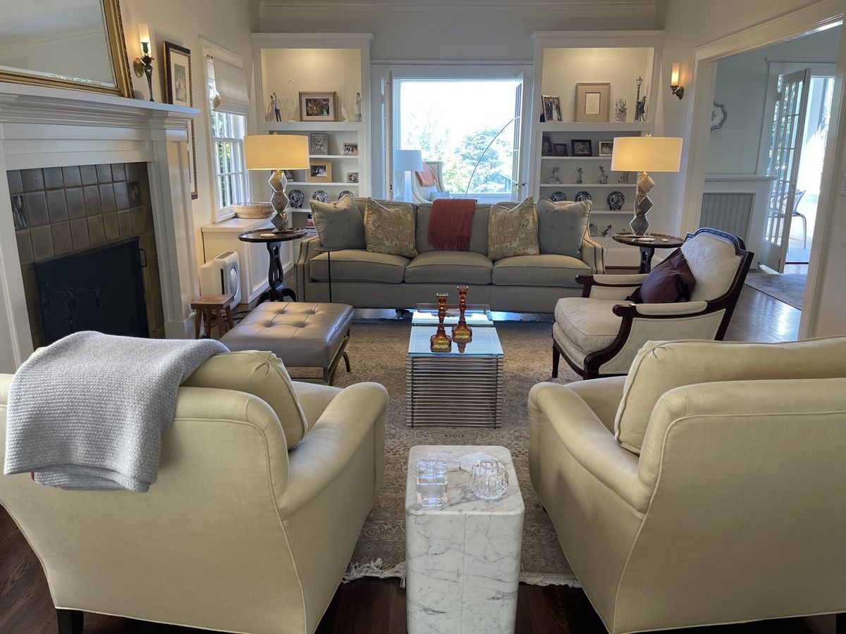 Living room seating area with historic architectural details — Capitol Hill Colonial, Seattle
